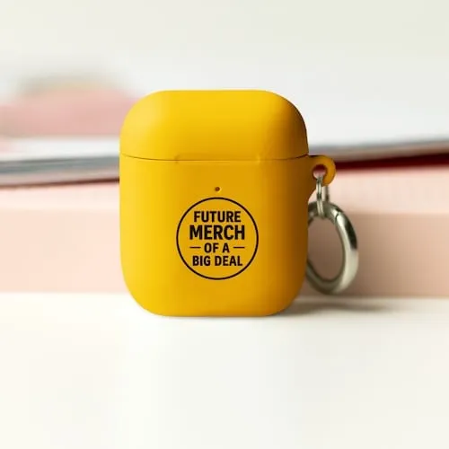 A yellow Airpods case with black text that says Future Merch of a Big Deal representing tech accessory promotional products available in our store for same-day online ordering in Orlando .